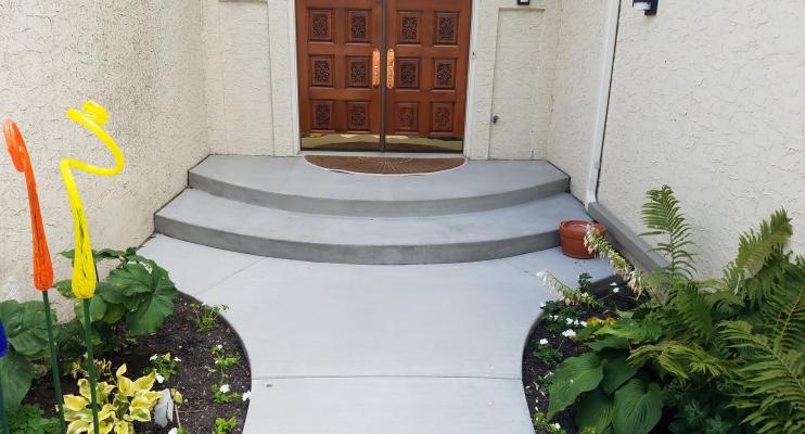 Rounded Concrete Steps and Sidewalk