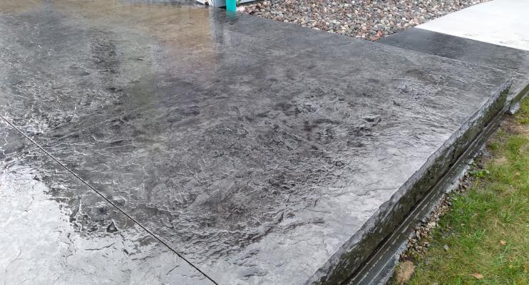 Nord Project Stamped concrete patio with Hammered Edge