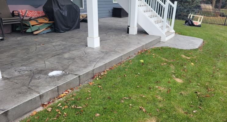 Vang Project Stamped Concrete Patio Under Deck in Minnesota
