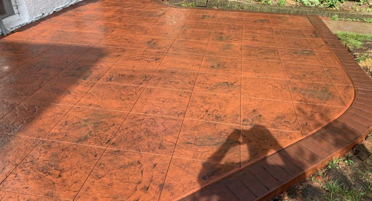 Stamped Concrete Patio with Brick Border